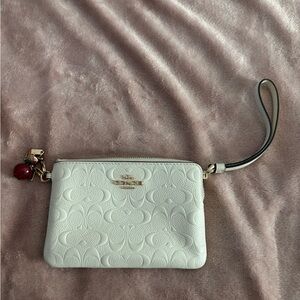 ❌sold❌Coach wristlet with charms